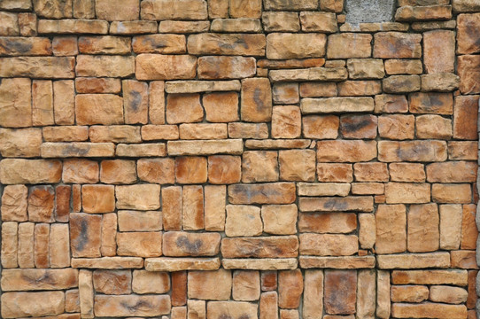 粽色石砖墙面纹理背景