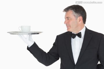 服务员托着咖啡杯的托盘