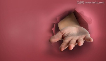 沖破紙張的手臂