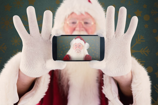 圣诞老人拿着手机的复合形象