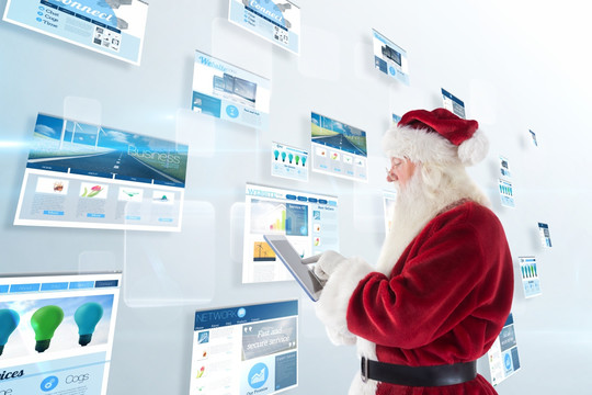 圣诞老人使用平板电脑的复合形象