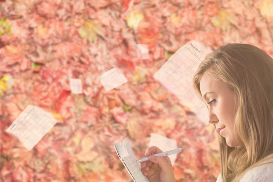 金發(fā)女人拿著筆書寫的復合形象
