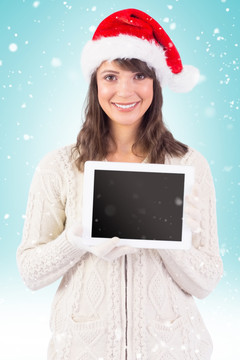 圣诞节拿着平板电脑的美女