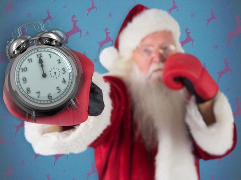 圣诞老人拿着闹钟的复合形象