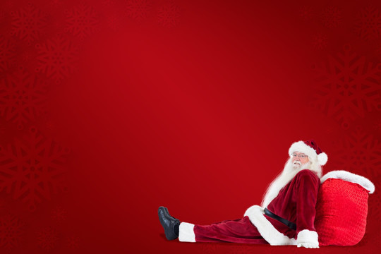 圣诞老人坐在地上的复合形象