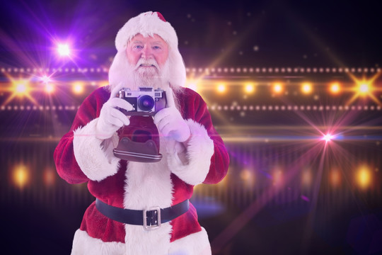 圣诞老人拿着相机的复合形象
