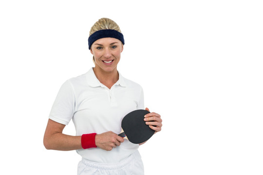 女运动员拿着乒乓球拍
