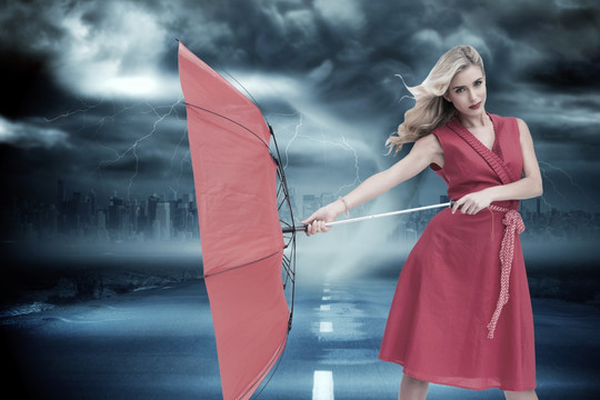 商务女人撑伞的复合形象