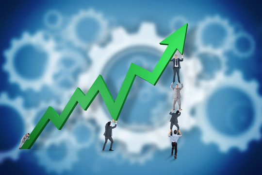 企業(yè)團隊舉著數(shù)據(jù)的復合形象