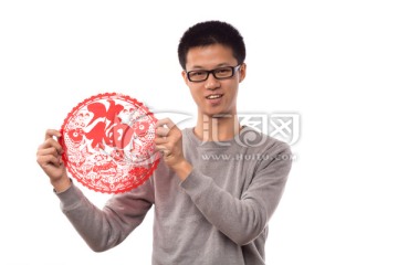 手拿福字的中国男孩