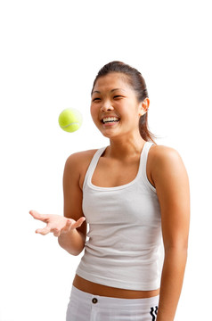年轻女子抛网球