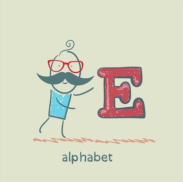 男子站在字母表的字母