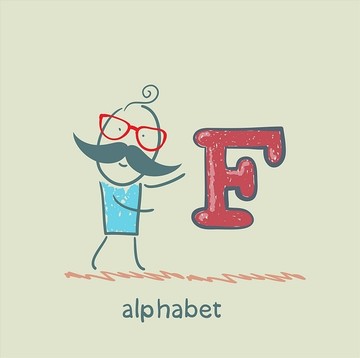男子站在字母表的字母