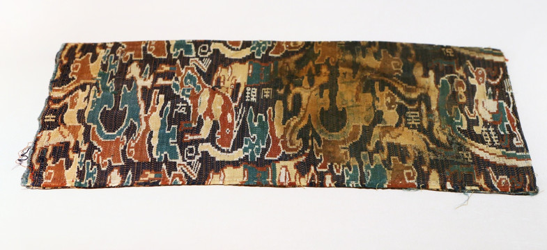 汉代动物纹织锦枕套