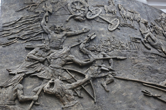 壁刻古代狩猎人物图