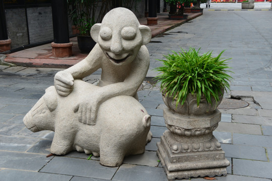 现代石雕艺术 养猪人