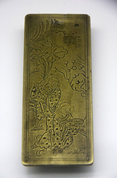 人物纹理铜质镇纸