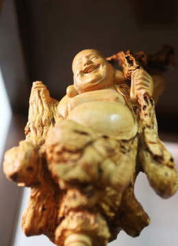 木雕大肚肚子和尚雕像