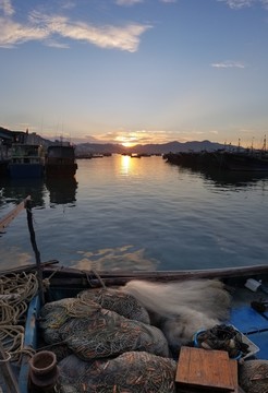 清晨渔港 日出 海上日出 渔船