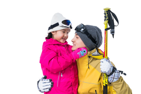 年轻爸爸和女儿滑雪