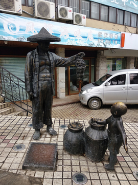 渔民卖螃蟹雕塑