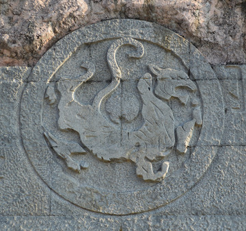 古代动物石雕圆形图案