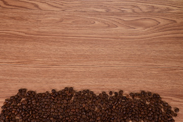 木桌上的咖啡豆背景