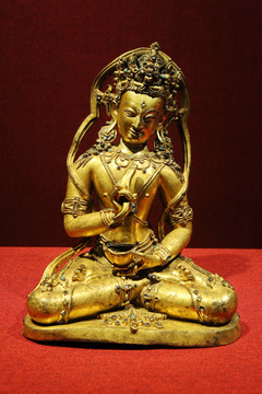 帝洛巴嵌松石鎏金铜像1西藏