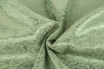 淡绿色缎面暗花窗帘布背景
