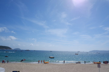 海南三亚海浪沙滩蓝天白云