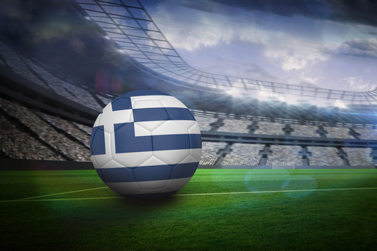 希腊足球在带灯的大型足球场上