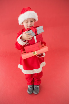 红底圣诞老人装可爱小男孩