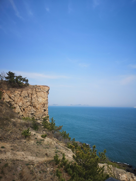 大连石槽风景区老人与海石像