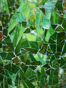 绿色瓷砖碎片拼接的墙面花纹背景