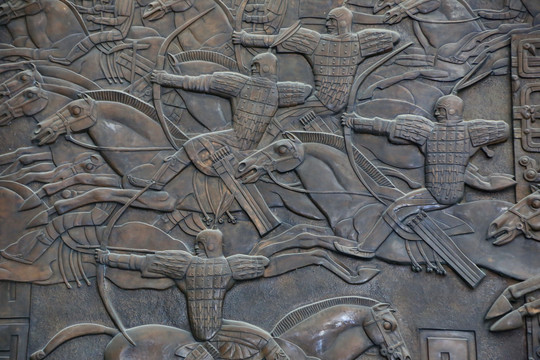 古代战场骑马射箭浮雕