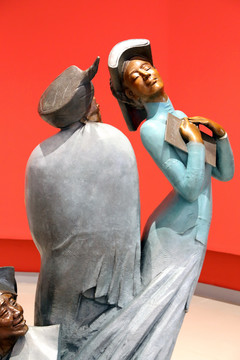 彝族少女雕塑