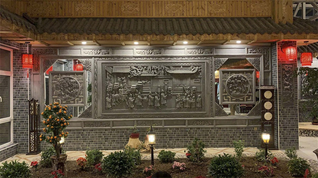 新中式特色餐饮装修风唐语砖雕