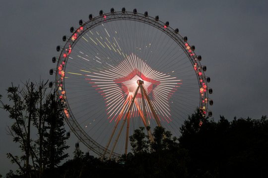 摩天轮夜景观景轮渝乐小镇夜景