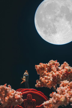 中秋节月饼情侣拥抱月球
