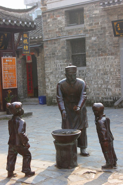 三河米饺制作铜像