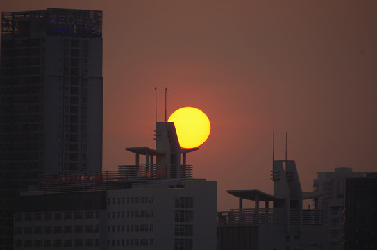 都市风光夕阳西下摄影图