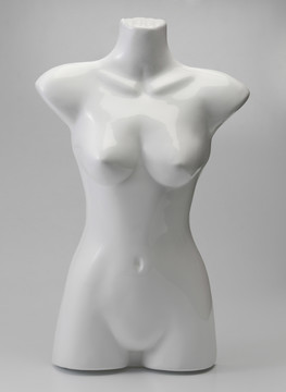 素色背景下的裸体女性人体模特
