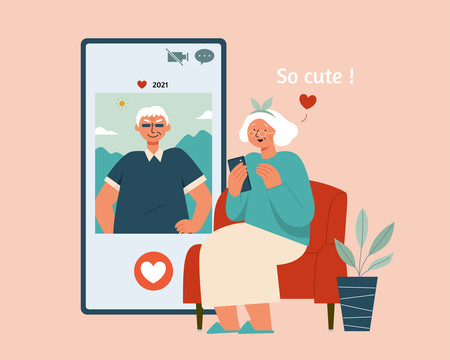老年妇女在交友软件对同龄男子的照片按爱心