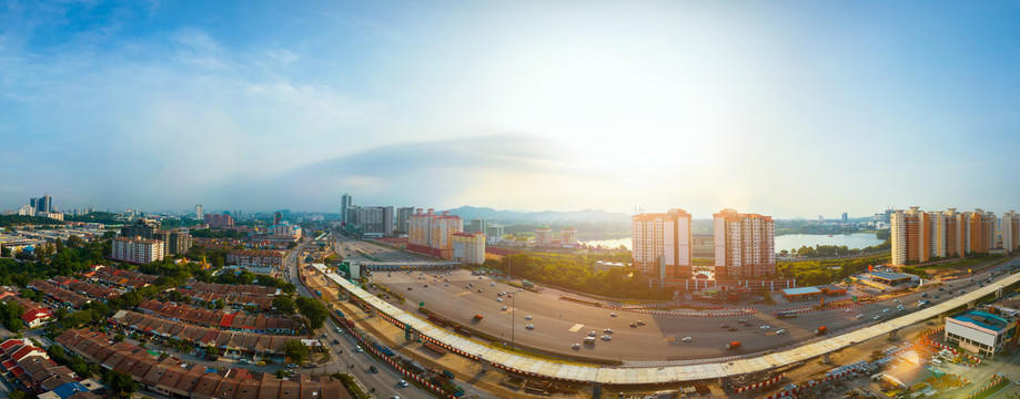 夕阳光芒吉隆坡小镇社区交通全景摄影照