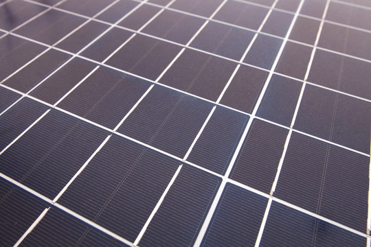 蓝色格子状太阳能发电板背景