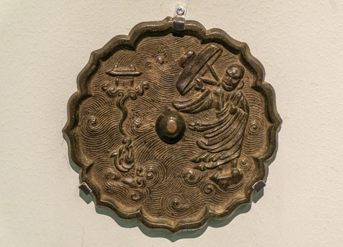 金代达摩渡海纹菱式铜镜