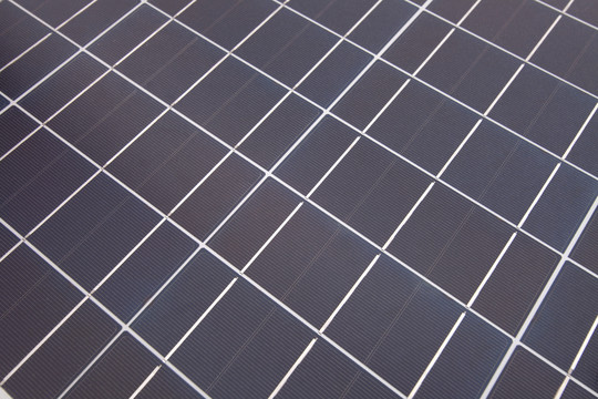 蓝色格子状太阳能发电板背景