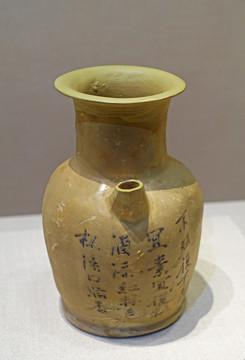 唐代青釉褐彩詩文壺