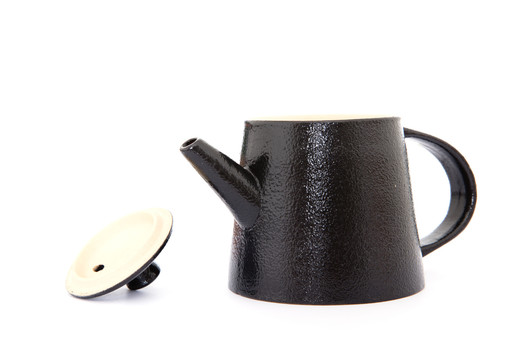 白背景上一个掀开盖子的茶壶