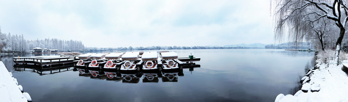 西湖游船码头雪景